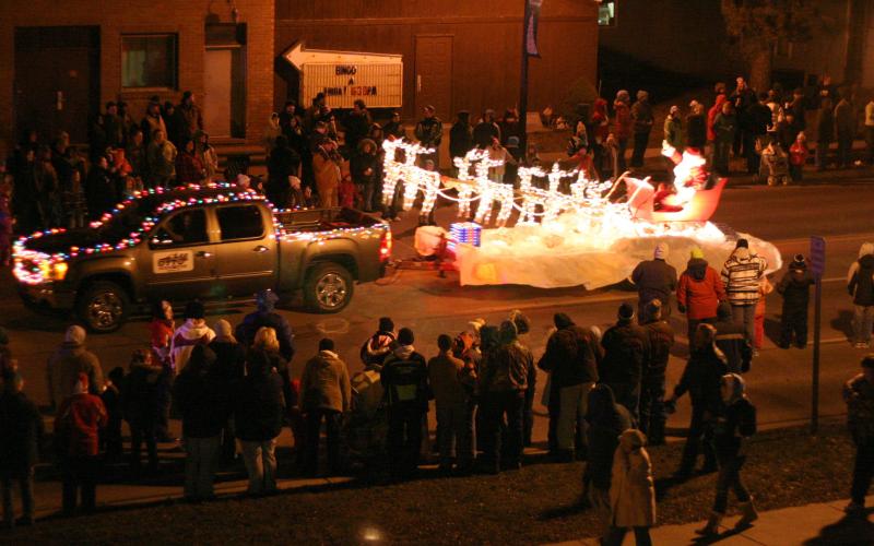 This photo was taken at the Gladwin Christmas parade in 2010. At that time, the parade ended in the city park, so they marched past the courthouse and entered the park via the street between the courthouse and the sheriff’s office. After assembling in the park, the community enjoyed a fireworks display. The park was also adorned with lighted decorations. Unfortunately, persistent vandalism put an end to that practice. PHOTO COURTESY OF BOB FREI