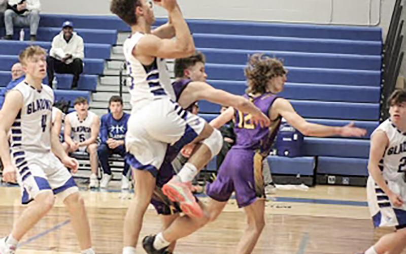 Gladwin’s Jhace Massey takes it to the rim during a game last season. The senior returns to the lineup for the Flying G’s this year.