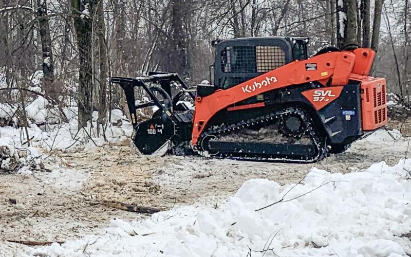 Forestry mowing of invasive plant species being done at Gladwin City Park.