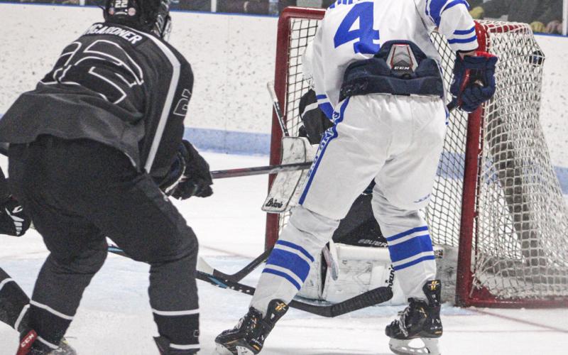 The puck is in the top corner of the goal after Ike Wheeler put it there in the third period of Saturday’s game.