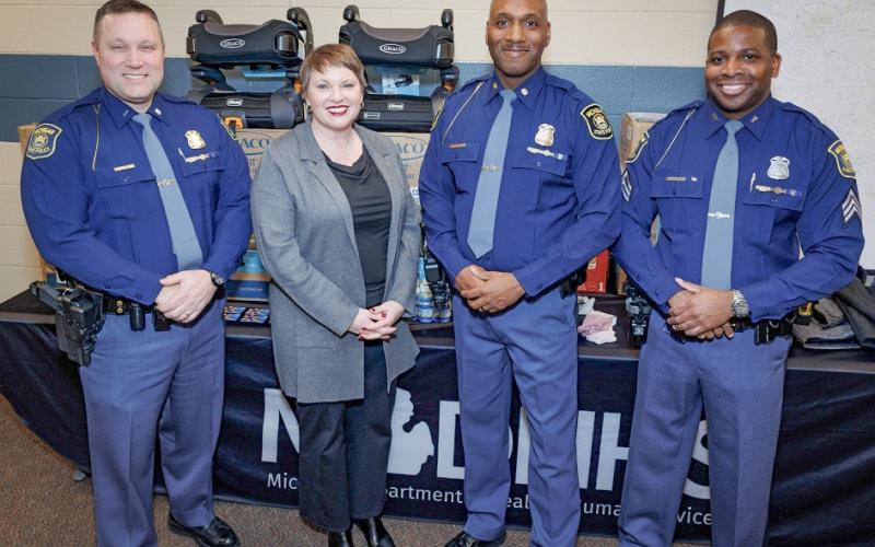 Pictured left to right are: Insp. Barry Schrader, MSP Field Services Bureau; MDHHS Director Elizabeth Hertel; MSP Director Col. James F. Grady II; Sgt. Ronnie Evans, MSP Planning, Research and Accreditation Section.
