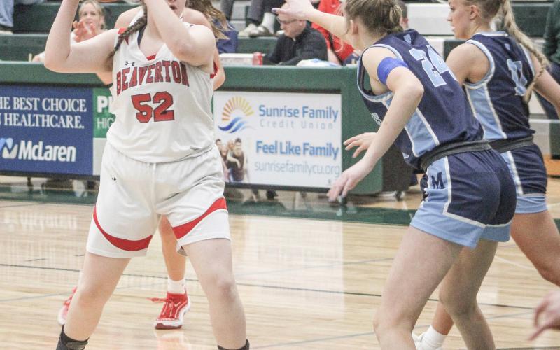 Beaverton’s Abby Northrup looks inside during last Wednesday night’s Division 3 district semifinal game against Meridian at Pinconning.