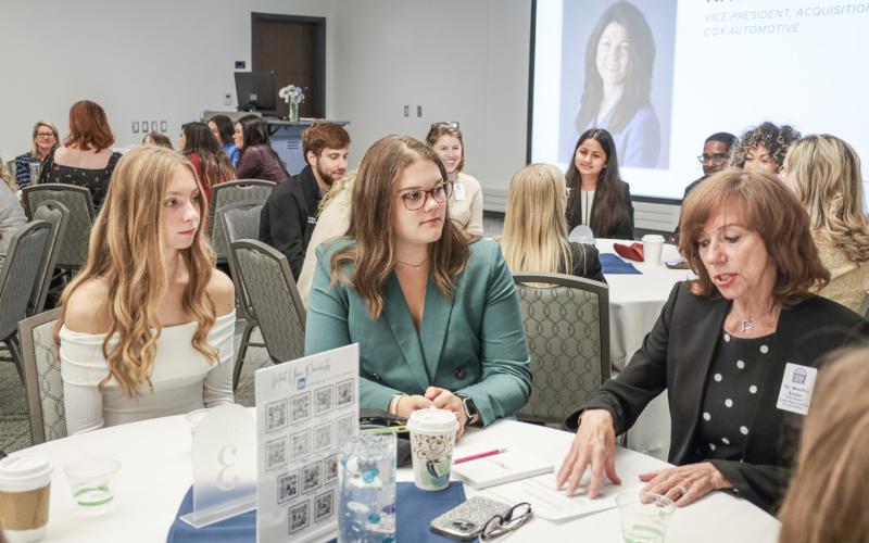 Students interact with industry professionals during the Driven by Women Automotive Roundtable at the 2024 Northwood University International Auto Show.