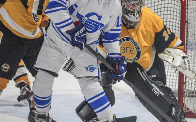 Gladwin’s Drew von Matt creates traffic in front of the Bishop Foley goal Saturday.