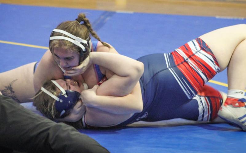 Gladwin’s Caiden Ross battles it out during a recent match. The Flying G’s opened the Jack Pine Conference dual meet season with a pair of wins last week.