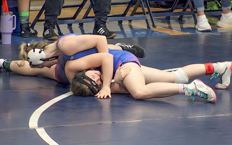 Gladwin’s Lily Miller wrestles her way to a gold medal at Friday night’s girls-only invitational, which was hosted by the Flying G’s.