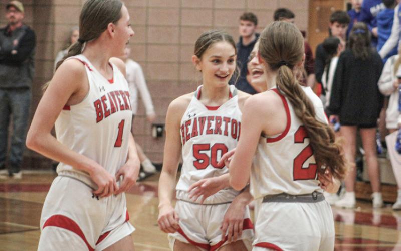 Trinity Danielak, Myah Hubble and Bryar Pollard enjoy life and a big lead during a time out.
