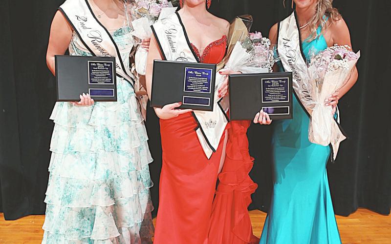 Second Runner-up Isabelle Dodman, Miss Gladwin County Audrey Schmidt and First Runner-up Braylin Orton pose with the crowns and certificates they received after Saturday’s Showcase at Gladwin High School.