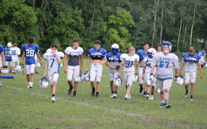 Pictured are the JV and Varsity boys working hard at practice.