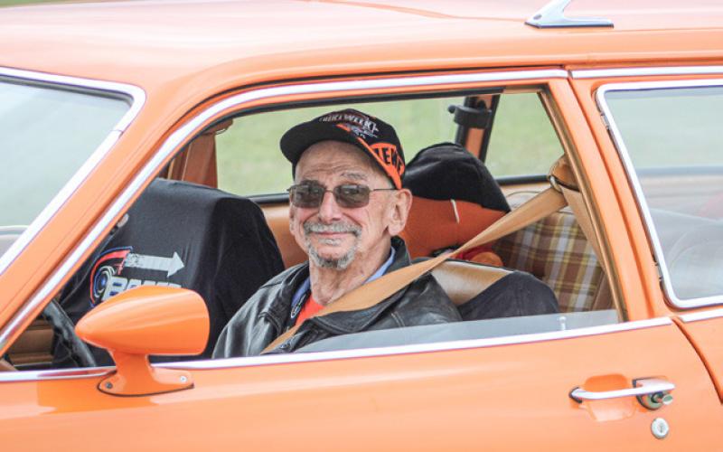 Noise, smoke (and a few raindrops) filled the air Saturday when Thunder on the Strip drag racing returned to the airport. Among the drivers was “Jimmy The Greek” from St. Helen’s (inset) who regularly brings his bright orange Ford Pinto wagon to burn up the track and remind us all of the glory years of Jimmy Carter’s presidency.