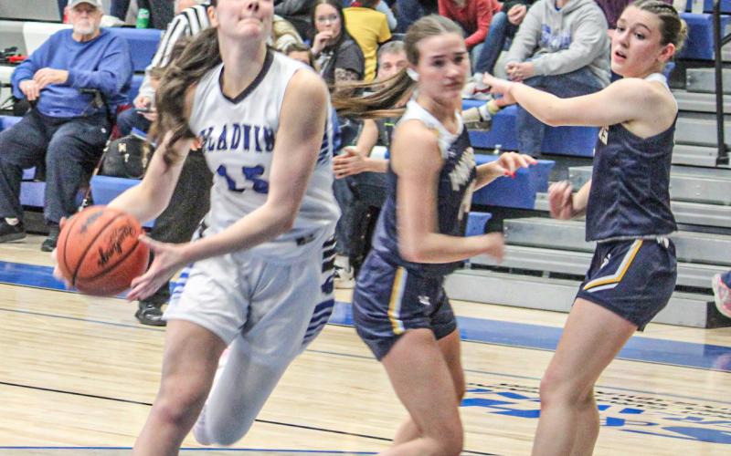 Gladwin’s Ava Gary goes to the basket for a lay-up. The senior scored eight points in her final game last Wednesday.
