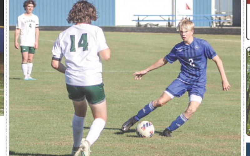 Gladwin’s Brady Demory puts the moves on the Clare defense during a recent game. The Flying G’s won big last Monday and lost in a similar fashion on Wednesday.