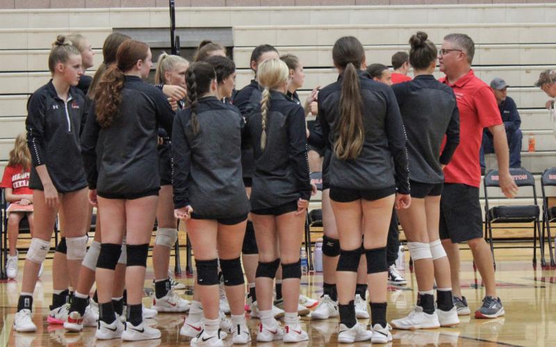 Beaverton volleyball coach boosting the girls up.