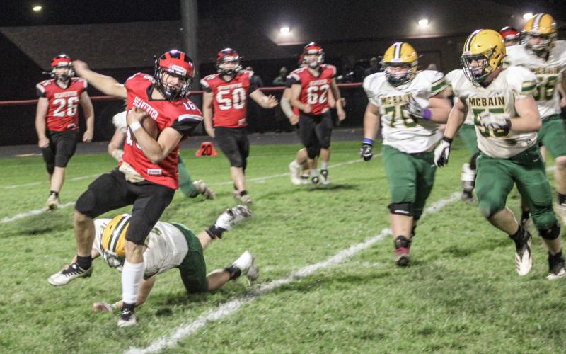 Beaverton’s offense attempts to get through McBain last Friday during the Division 7 district championship game.
