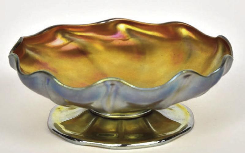 To a bottle collector, iridescence is a kind of damage. In the world of art glass, especially Tiffany’s, it’s an extremely desirable decoration.