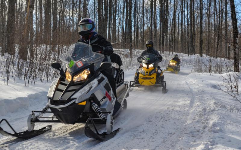 Snowmobilers enjoy a trail ride in Gogebic County.