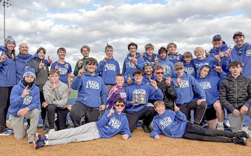 The Gladwin Junior High boys’ track team celebrates a successful trip to the Ithaca Relays last Thursday.