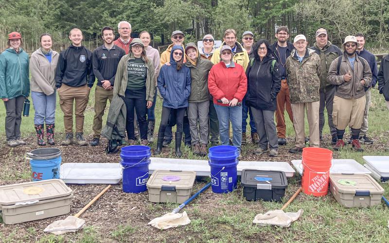 The teams of volunteers gathered to collect their equipment and marching orders prior to performing water quality tests on the Cedar River Saturday.