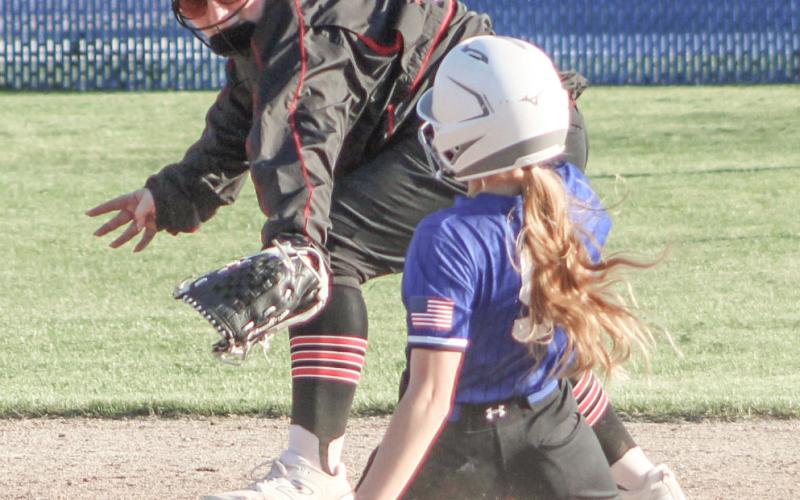 Gladwin’s Kelsie Greaves slides into second base with a double during last week’s doubleheader sweep of rival Beaverton.