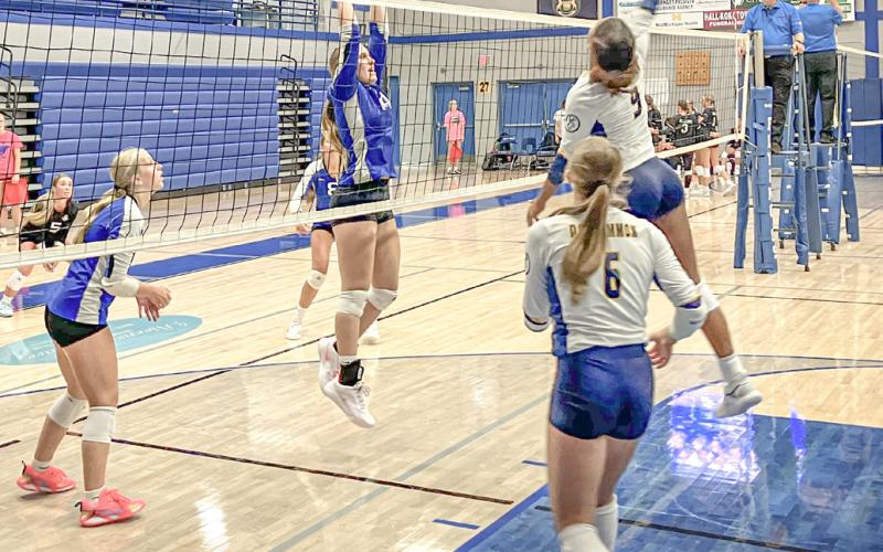 Gladwin’s Graycin Guoan goes up for the block during last week’s match against visiting Roscommon.