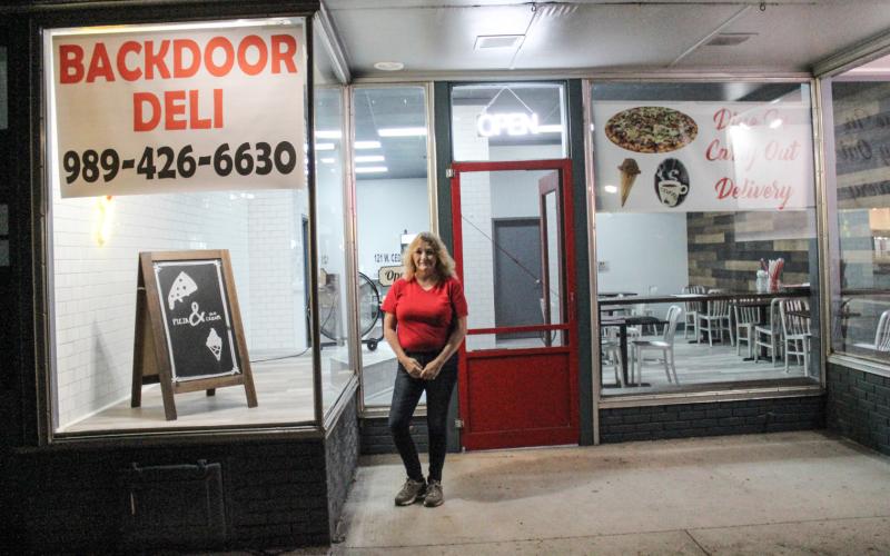 Back Door Deli have announced that their storefront is officially open and held their Grand Opening on Friday, October 6. Ronita Skinner is pictured in front of Back Door Deli’s new storefront. Coming with the new storefront is coffee, ice cream, and breakfast pizza. Breakfast pizza will be served from 7-11 a.m. on Friday and Saturday, and from 8-11 a.m. on Sunday every week.