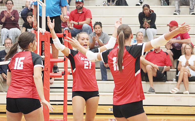 Harper Pollard leads the cheers after a service ace during Beaverton’s victory over Saginaw United last Wednesday.