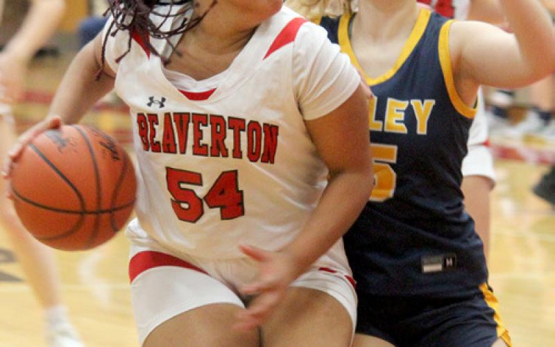 Beaverton’s Leiyah Mungin attempts to go around a Valley Lutheran defender.