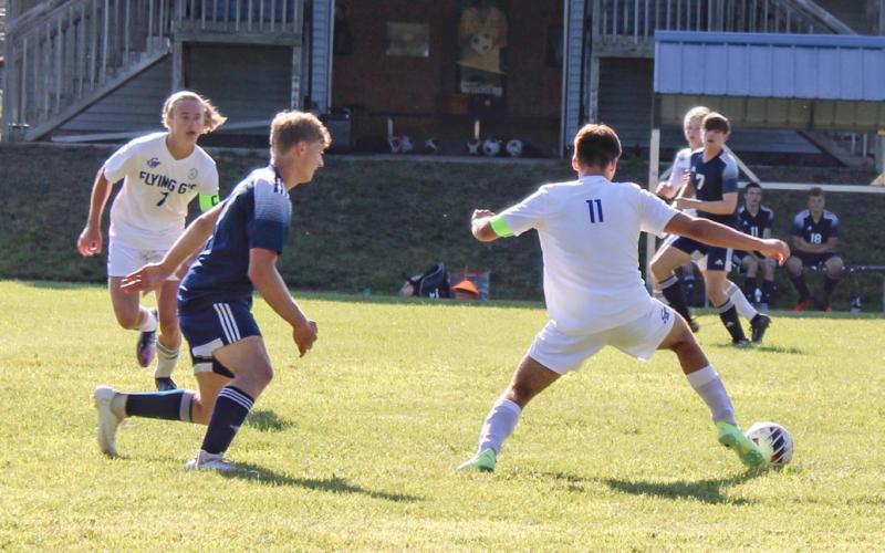 Pictured is player #7 Treyton Siegert, and #11 Andrew Von matt moving upfield against Roscommon.