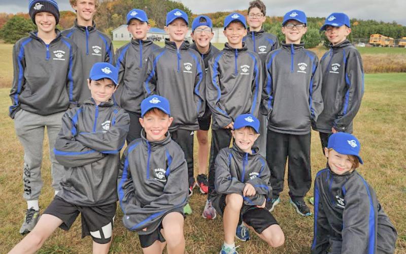 The boys before the meet in their warm up jackets and hats donated to the team by Mr. Kurt Hansen. The team would like to thank Mr. Hansen for his donation.