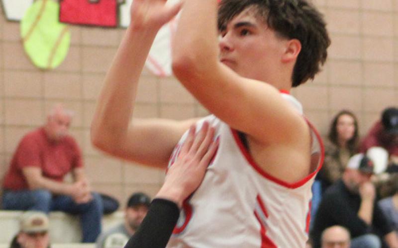 Beaverton’s Landon Love goes up for two during Monday night’s win.