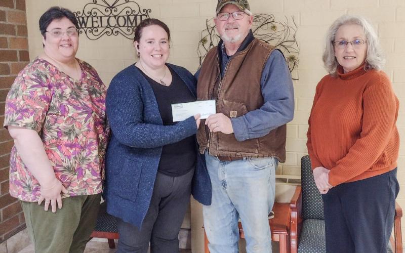 Presentation of $200 check to Veteran’s (at left) and the Council on Aging (at right).