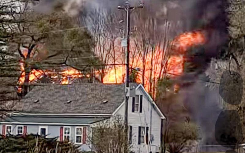 Old farm barn engulfed in fire