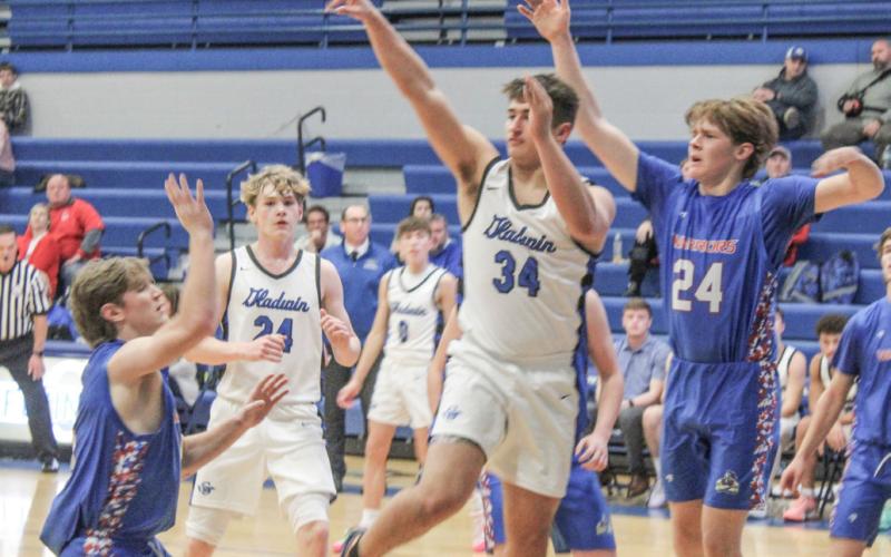 Gladwin’s Matthew Lechner kicks it outside during last Wednesday night’s victory over Remus Chippewa Hills.