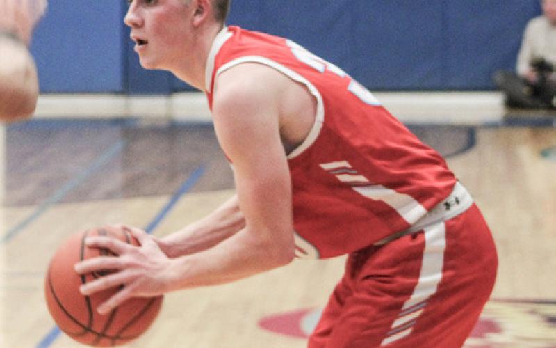 Beaverton’s Layk Woodruff looks for an open teammate. Woodruff scored 22 points in a 7022 victory at Shepherd Thursday night.