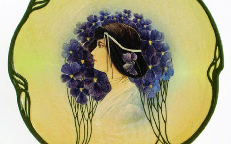 This art nouveau charger was made by the famous German ceramic company Mettlach in the Jugendstil style of the early 20th century. AUCTIONS AT SHOWPLACE