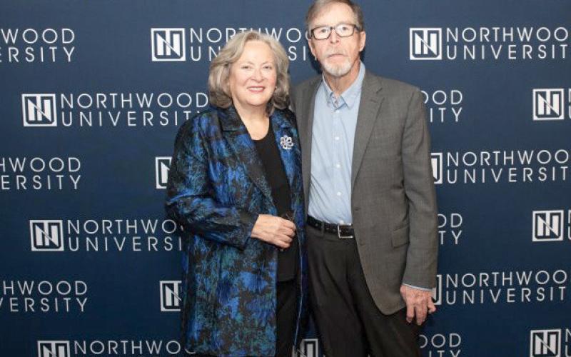 David J. Arnold is pictured with his wife, Bobbie, at the 2023 Winter Commencement at Northwood University.