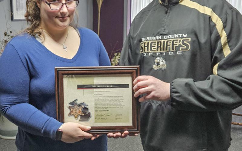 Pictured is Kimberly Khanafer and Sheriff Mike Shea.