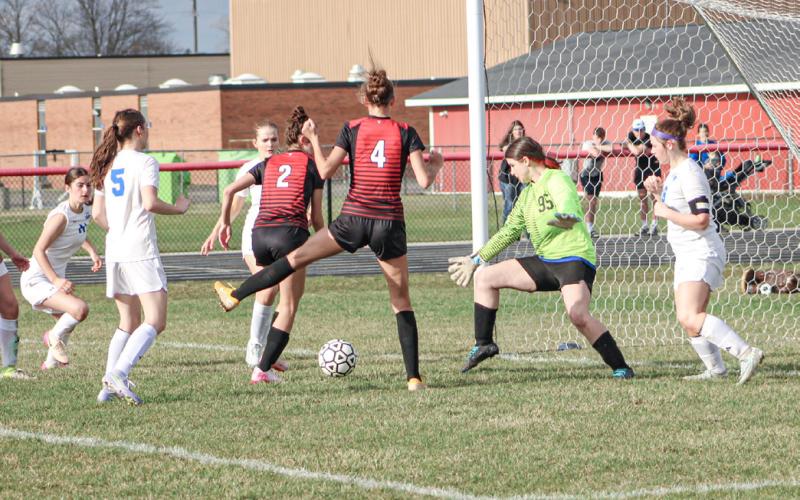 Beaverton’s Emily Skotynsky is about to score in front of teammate Trinity Danielak from right out in front of Gladwin’s goal during the second half of last week’s victory over the Flying G’s.