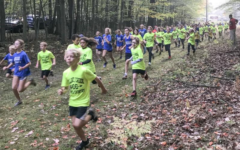 GJHS and GIS girls are pictured participating at the Jack Pine Conference Jamboree held at the Gladwin County Recreation Area October 4.