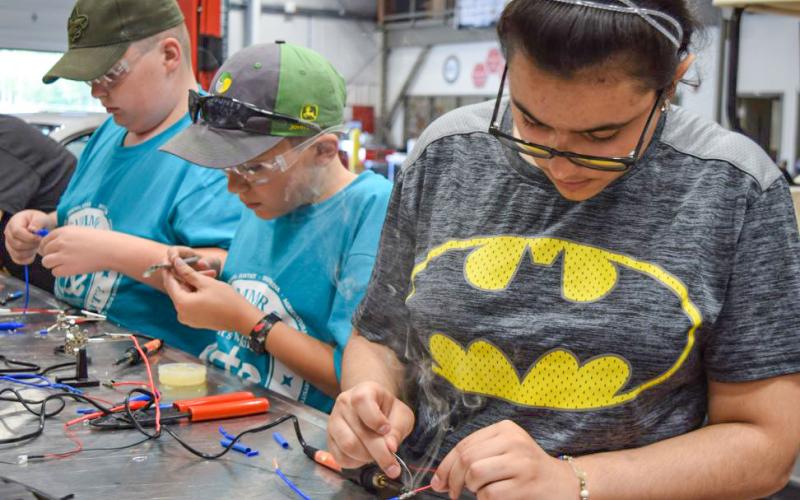 CTE Summer Camp students participate in handson learning in Automotive Technology.