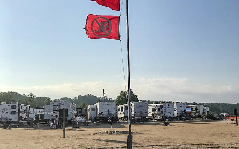Visitors at state-designated swim beaches along the Great Lakes in Michigan state parks should be aware of double red flag warnings, which mean do not enter the water.