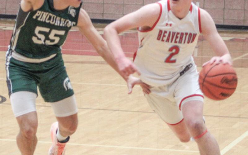Beaverton’s Ian Roberts heads to the basket during last Wednesday night’s loss to Pinconning in the district semifinals.
