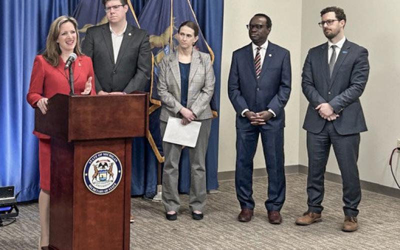 Secretary Benson spoke against the federal SAVE Act, which if enacted would block millions of Americans from exercising their constitutional right to cast a ballot. Pictured from left: Secretary Benson, Michigan Rep. Stephen Wooden (D), Melanie Macey, policy counsel with Promote the Vote, Deputy Secretary of State Aghogho Edevbie, and Kyle Zawacki, legislative director of the American Civil Liberties Union (ACLU) of Michigan.