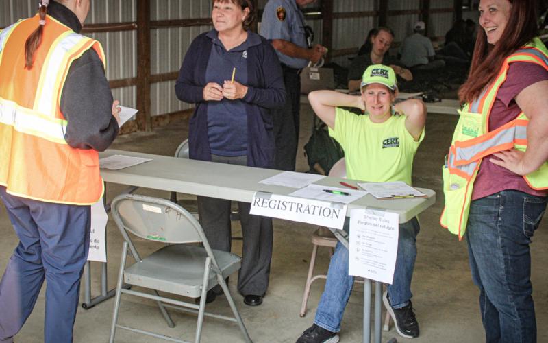 Gladwin County Community Emergency Response Team volunteers practice procedures for dealing with a disaster Saturday at the Fairgrounds.