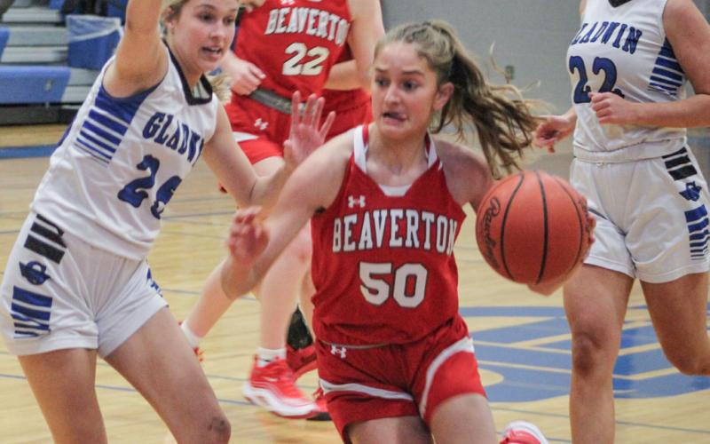 Beaverton’s Myah Hubble drives on Gladwin defender Breanna Campbell during the Flying G’s victory in the battle for the Cedar Cup last Tuesday.