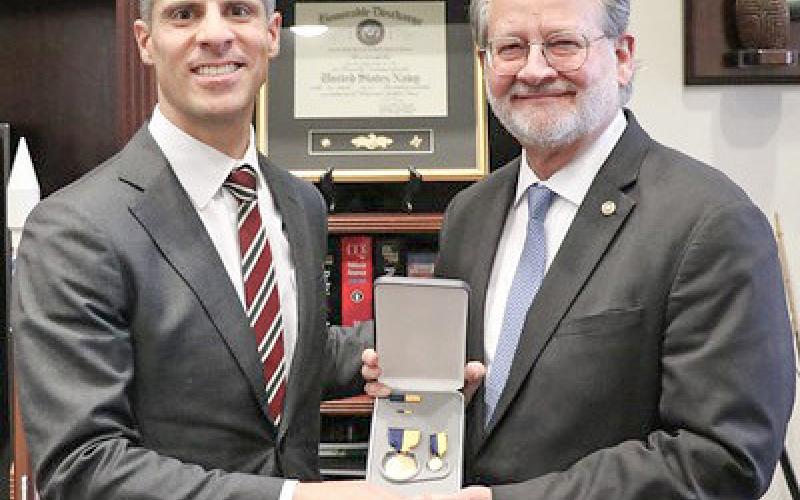 Pictured left to right are Thomas Mancinelli and Gary Peters.