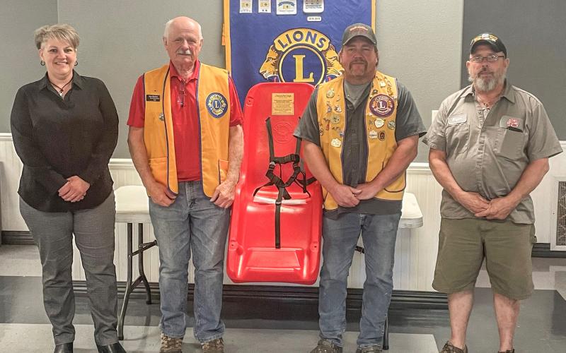 Pictured from left to right are Beaverton City Manager Shannon Siprilla, Lions Treasurer Al Bornick, President Bob Killian, and Beaverton Mayor Ray Nau.