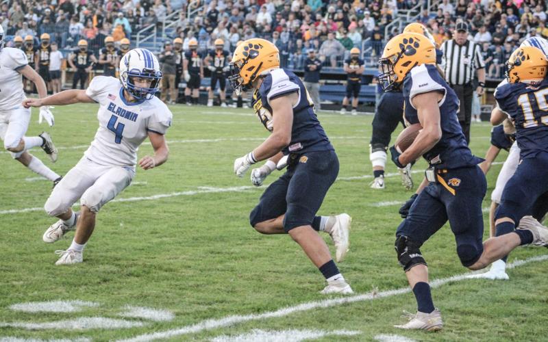 Gladwin’s Christian Vorce zeroes in on a Standish ball-carrier during Friday night’s victory. The Flying G’s will host their Homecoming game Friday night against Shepherd.