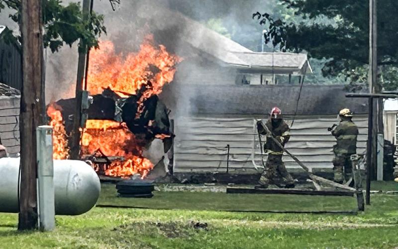 TRAILER ON FIRE IN HAY TOWNSHIP SCORCHES NEARBY BUILDING