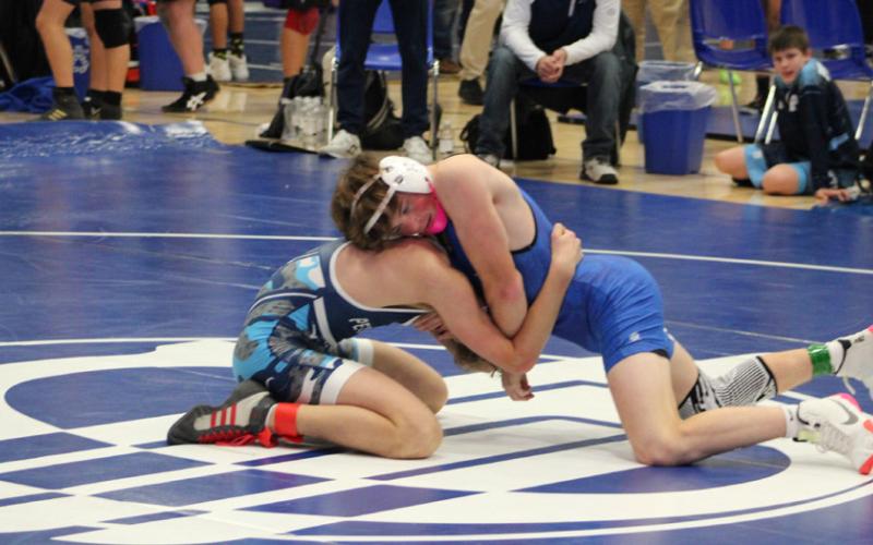 Gladwin’s Ethan Palmateer won the championship at 132 pounds Saturday during a tournament at Remus Chippewa Hills. SCOTT SALOWICH